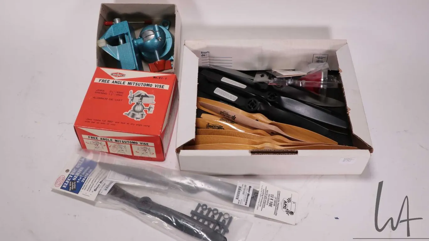 Selections of RC tools and props including Mitsutomo free angle vise, nylon spinner nose cone, alumi