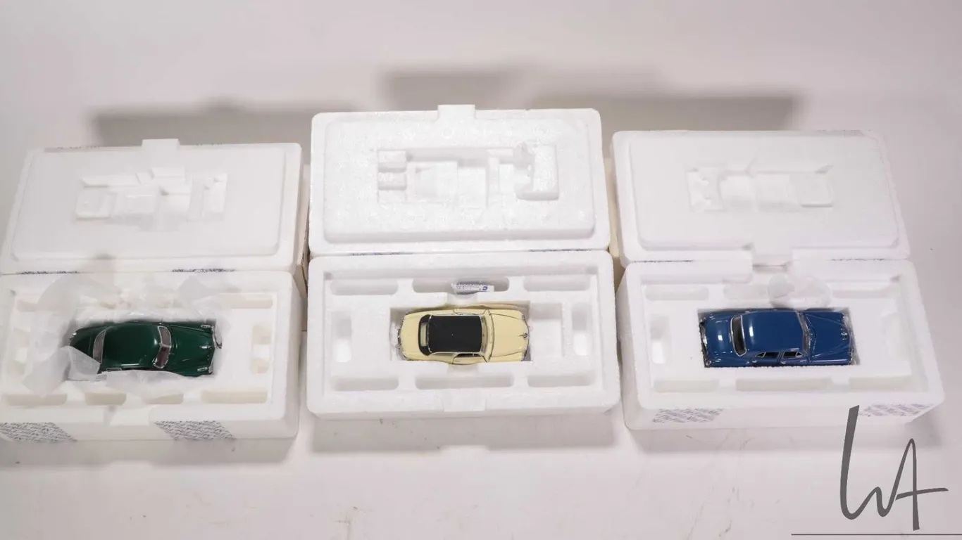 3 1:43 scale Franklin Mint die cast collectible cars including 1951 Hudson Hornet 2-door, 1950 Rambl
