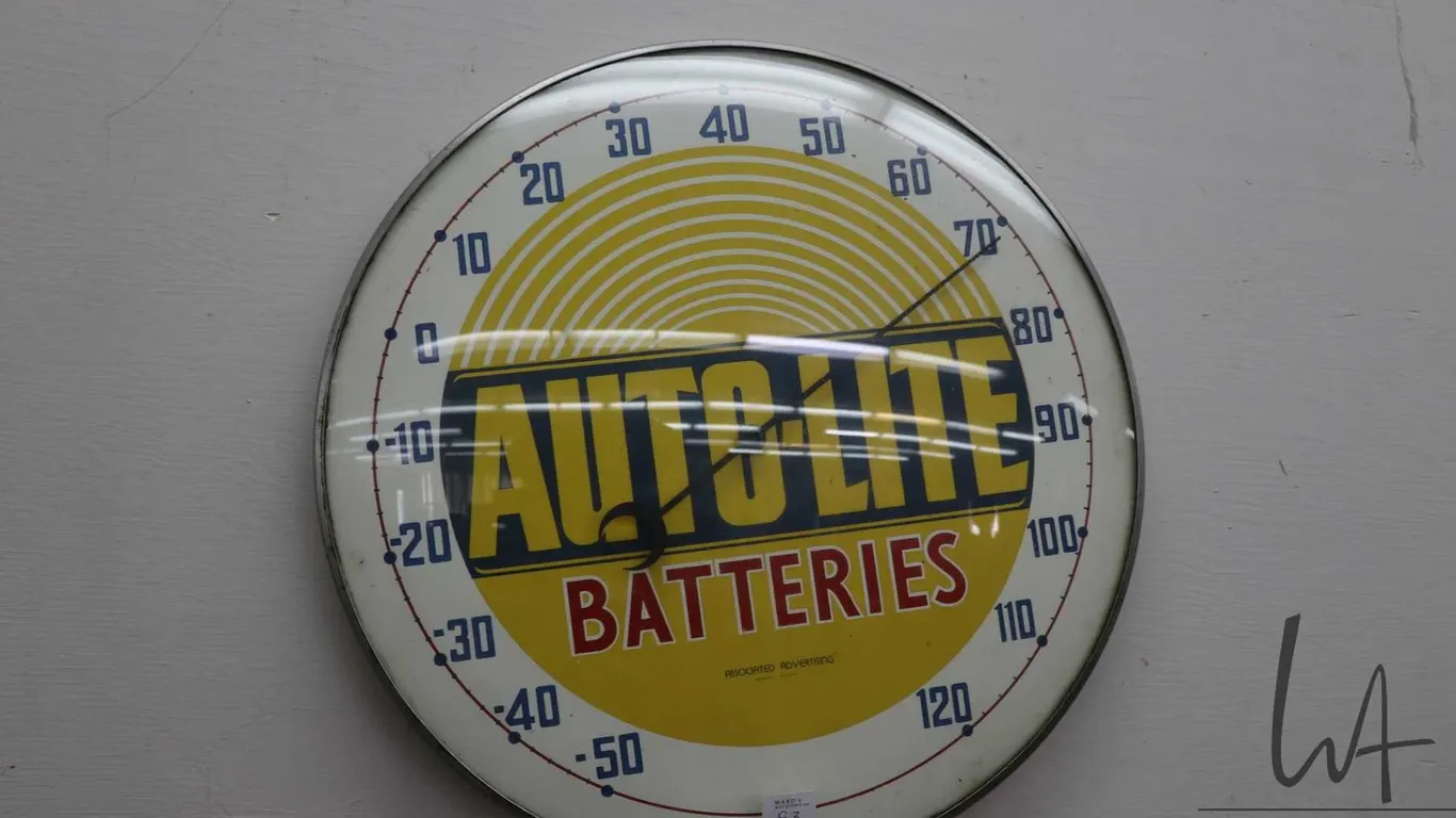 Vintage Auto-Lite Batteries thermometer, marked Assocated Advertising Weston Ontario, 16" in diamete