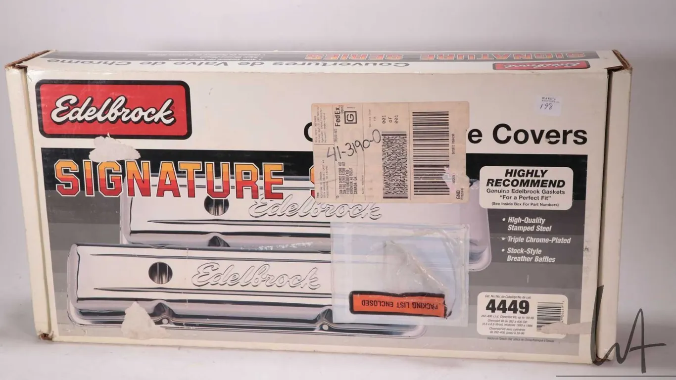 Set of chrome plated Edelbrock valve covers, part number 4449, fits 262-400cu Chevrolet V8 engines,