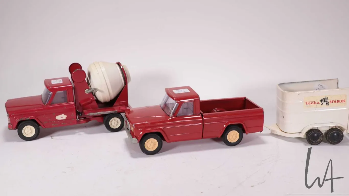 Selection of vintage Tonka toys including cement truck, pick-up truck and horse trailer