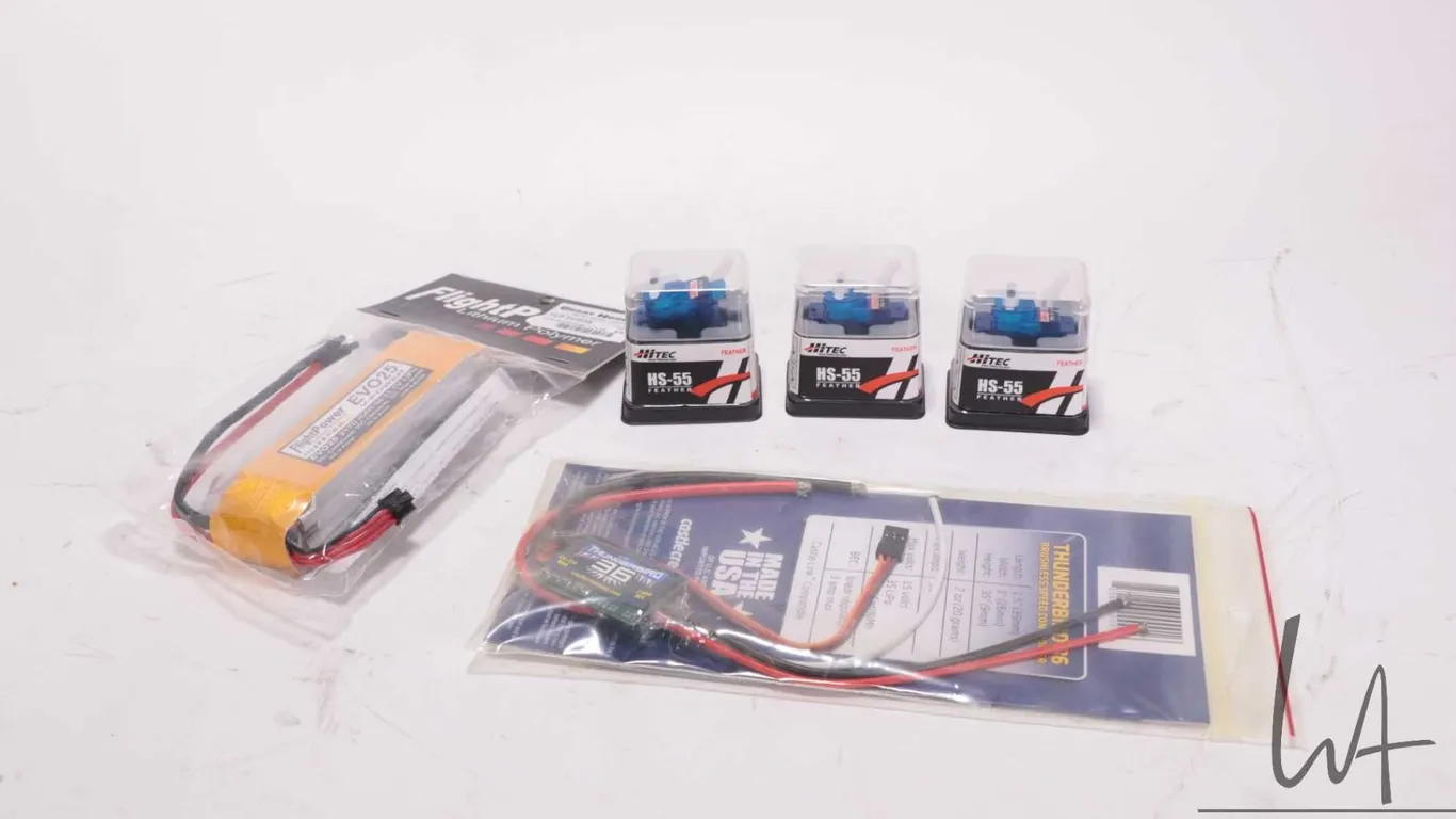 Selection of RC accessories including three Hitec GS-55 Feather Servos, Thunderbird 36 speed control