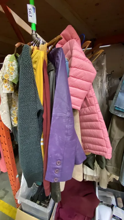 ONE RACK OF ASSORTED CLOTHING AND CURTAINS (MOSTLY CURTAINS) *RACK NOT INCLUDED*