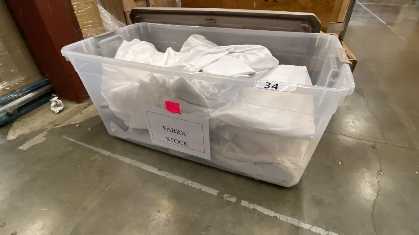 GROUP OF 6 PLASTIC STORAGE BIN OF WHITE DROP CLOTHS