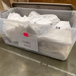 LARGE PLASTIC STORAGE BIN OF DROP CLOTHS