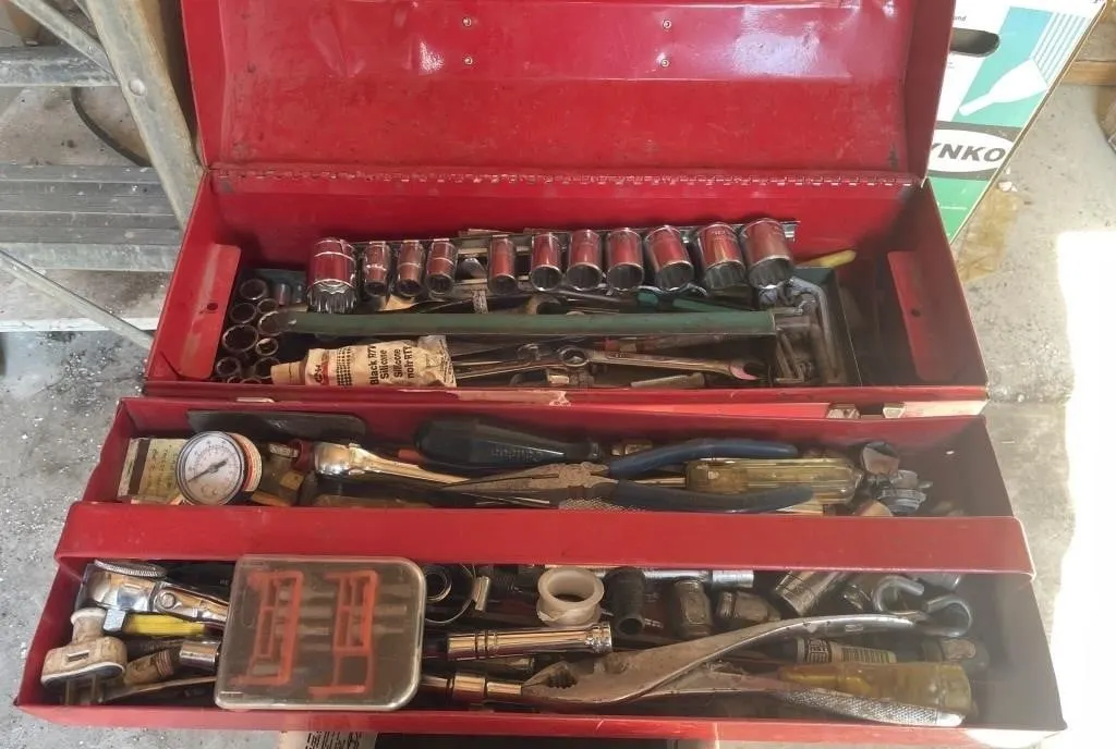 Toolbox and contents. Includes socket sets,