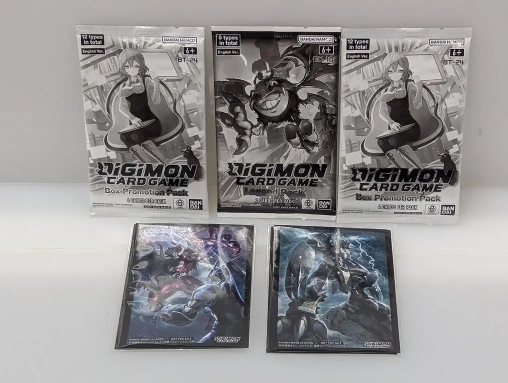 (3&2) Digimon Promo Packs and Card Sleeves