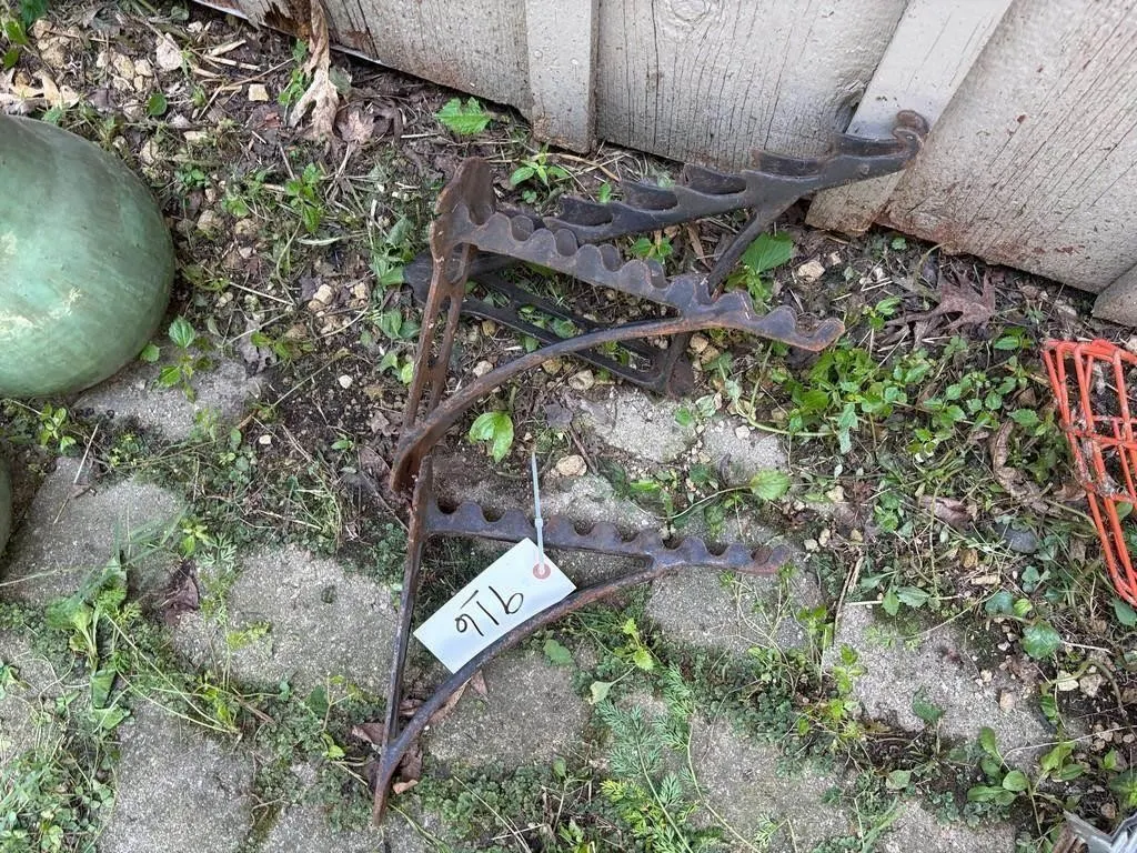 old iron tool hangers
