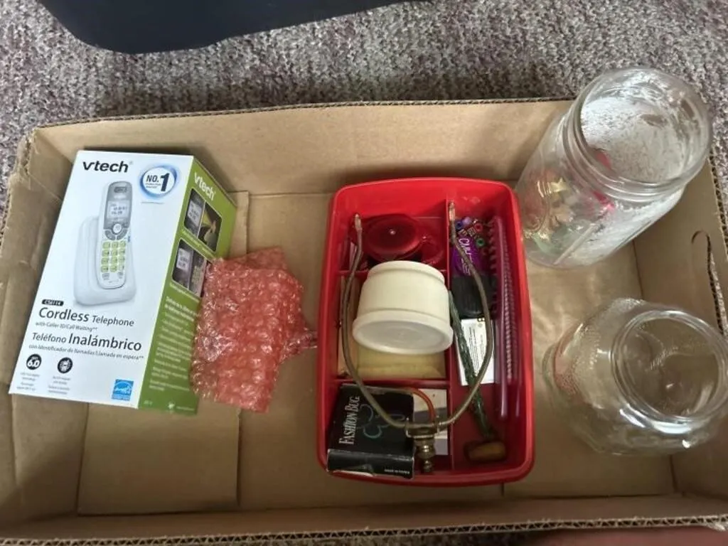 Cordless telephone Tupperware tape measure jars