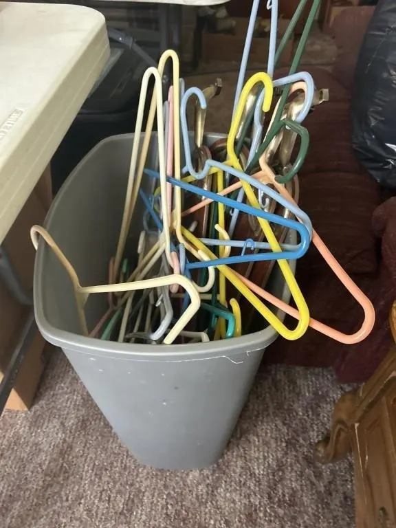 Trash can with hanger and fan blades