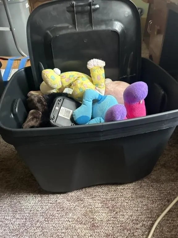 Three totes one full of stuffed animals with 3