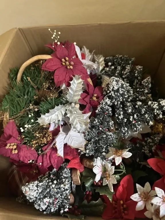 Box full of fake flowers