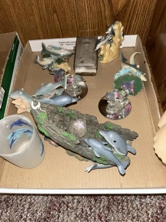 Ceramic dolphins