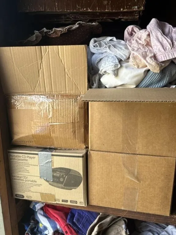 4 boxes of clothes