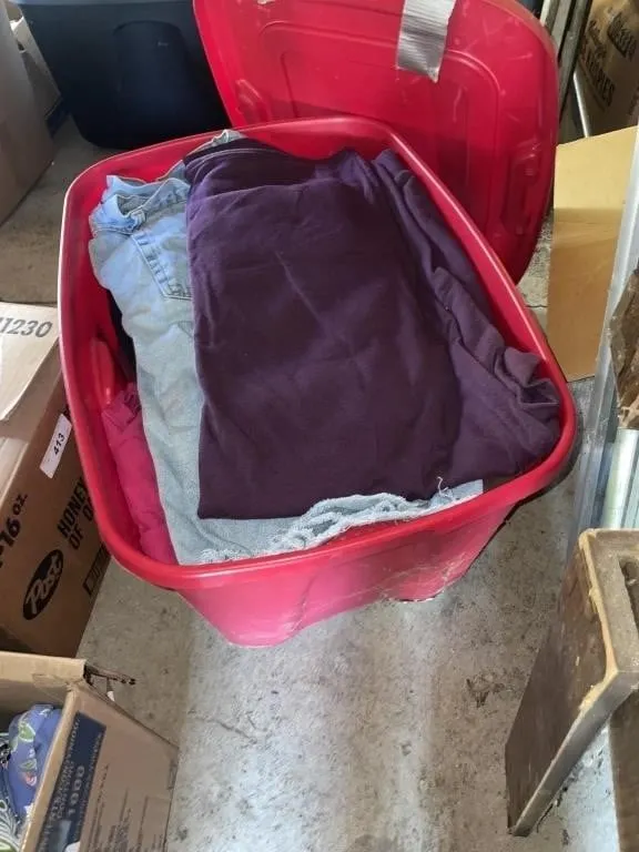 Red tote of clothes