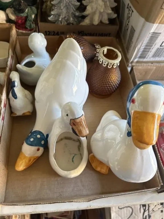 Ceramic geese and oil lamp covers
