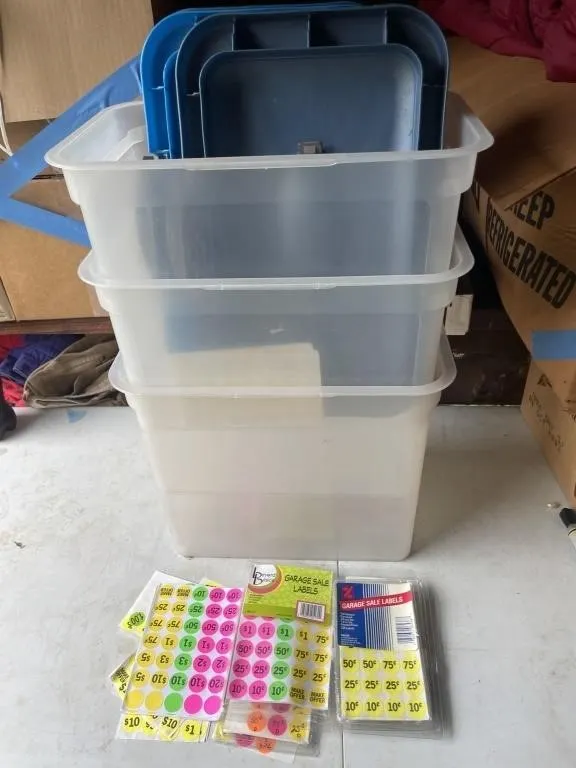 Three totes with lids, garage sale labels