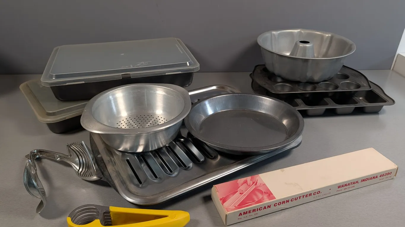 Assorted Bakeware and Kitchen Gadgets with Wilton and American Corn Cutter Co. Items