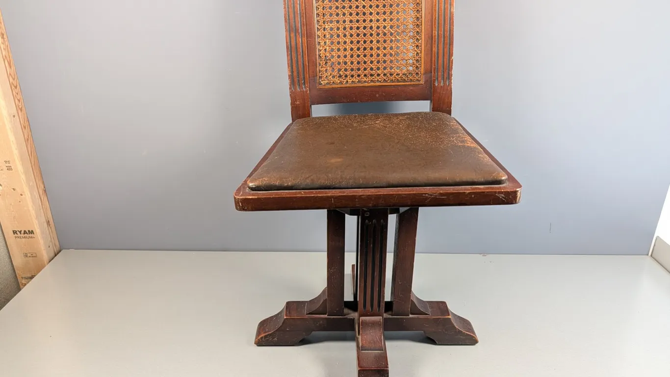 W. D. Allison Co. Wooden Swivel Chair with Cane Back