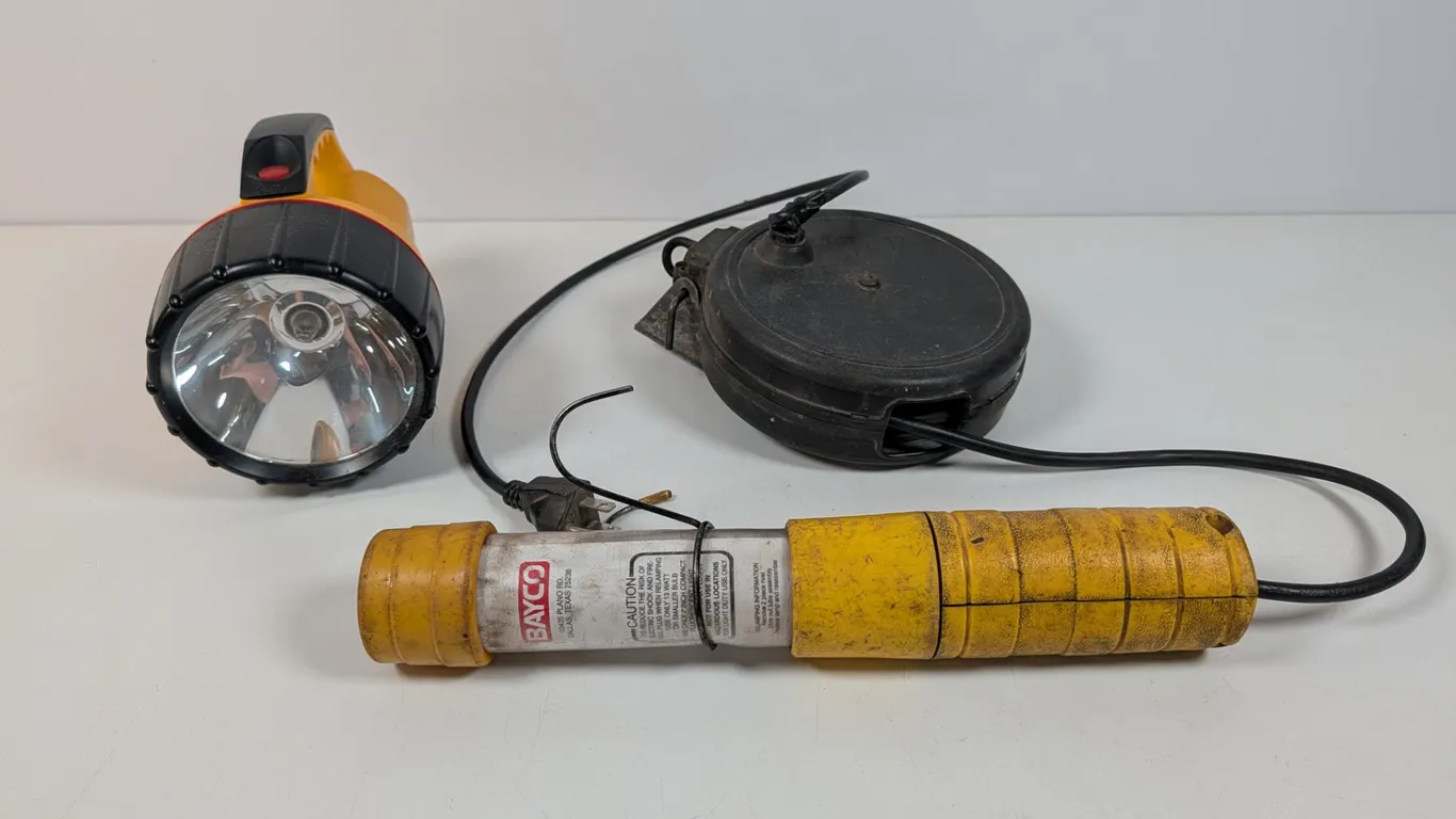 Lot of two work lights a Bayco Hanging Light and Rayovac Spotlight/ Lantern