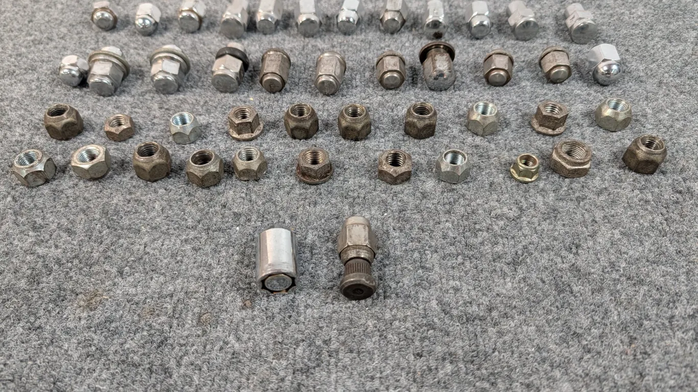 Assorted Automotive Lug Nuts and Wheel Locks