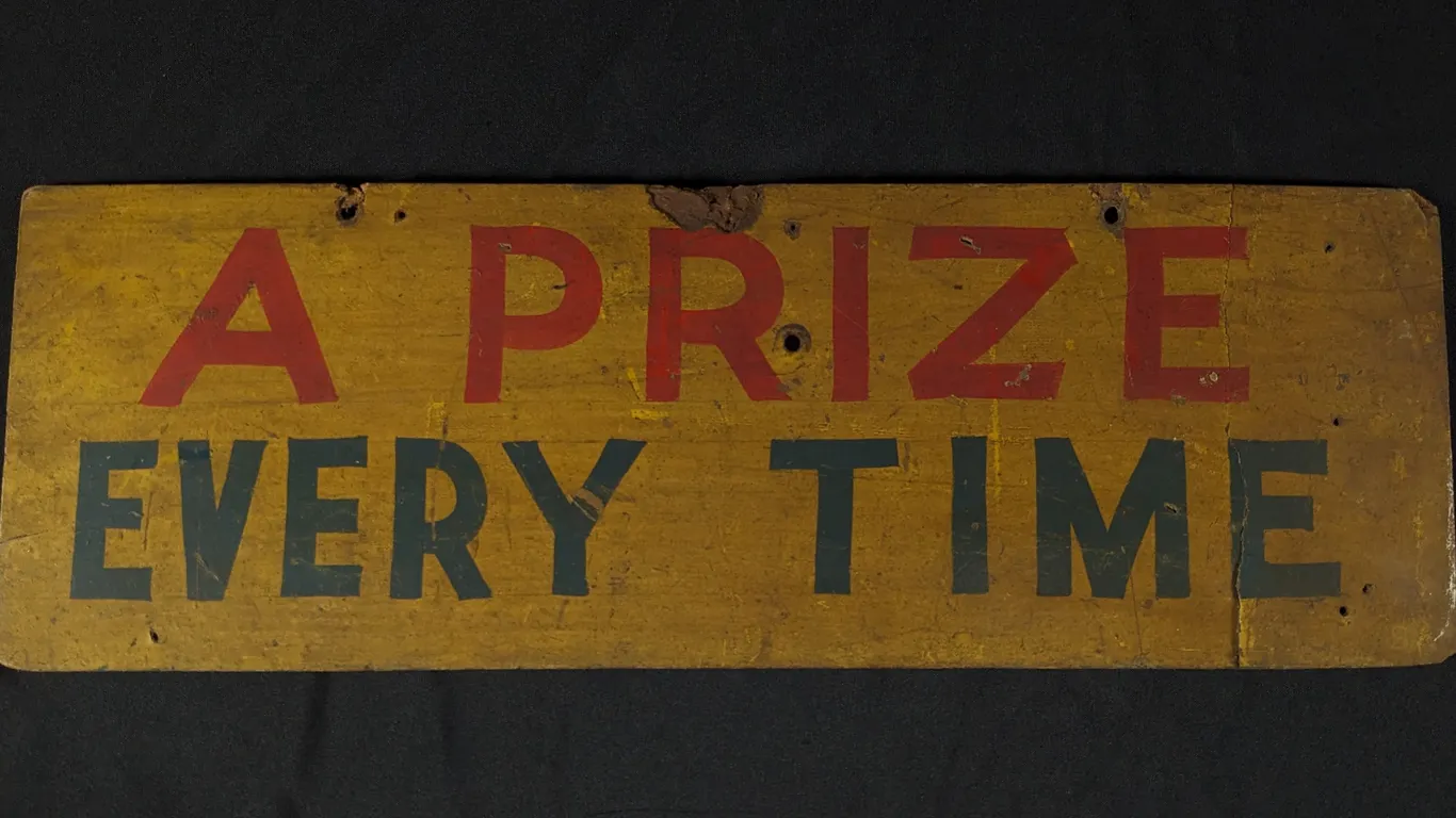 VINTAGE CIRCUS CARNIVAL MASONITE SIGN A PRIZE EVERY TIME