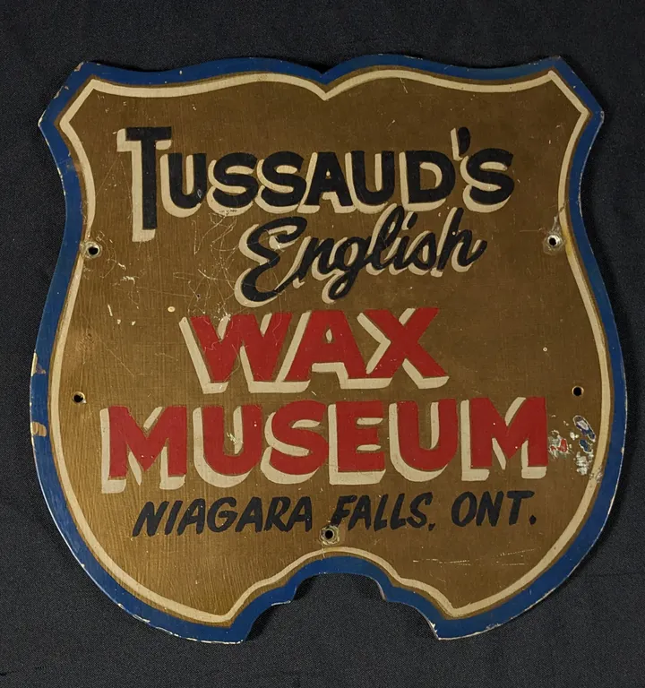 VINTAGE MASONITE SIGN TUSSAUD'S ENGLISH WAX MUSEUM NIAGRA FALLS ONTARIO CANADA