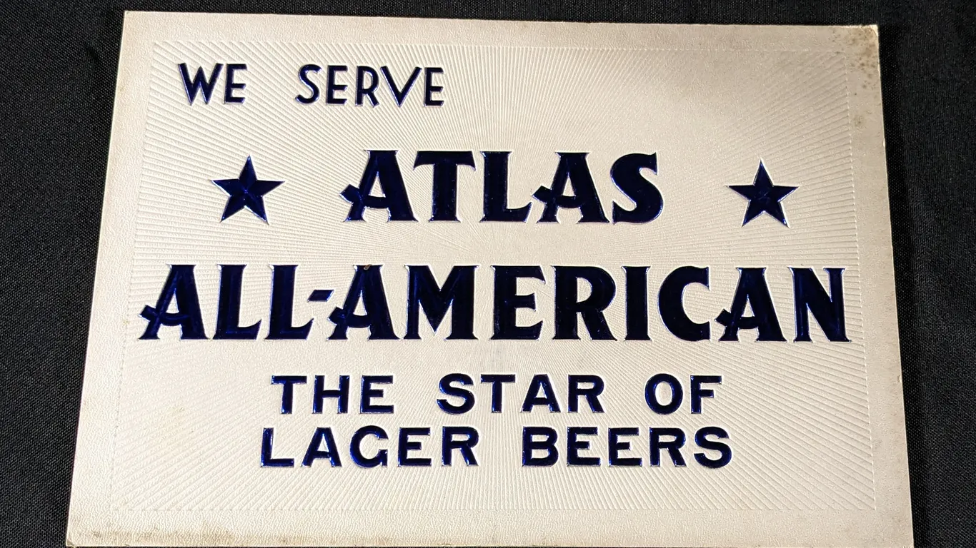 PRESSED CARDSTOCK SIGN WE SERVE ATLAS ALL-AMERICAN THE STAR OF LAGER BEERS CHICAGO ILLINOIS