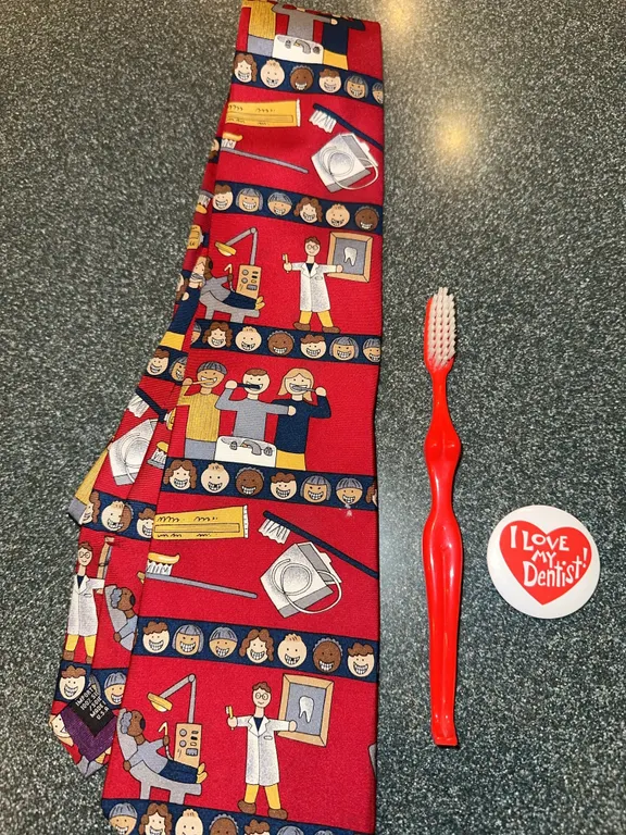 Silk dentist tie, naked lady toothbrush, etc.