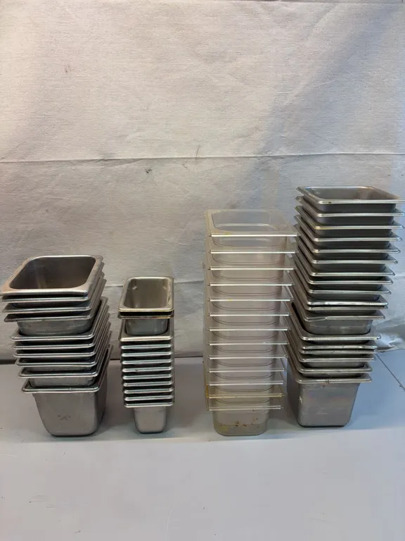Stainless Steel and Plastic Food Pans in Various Sizes