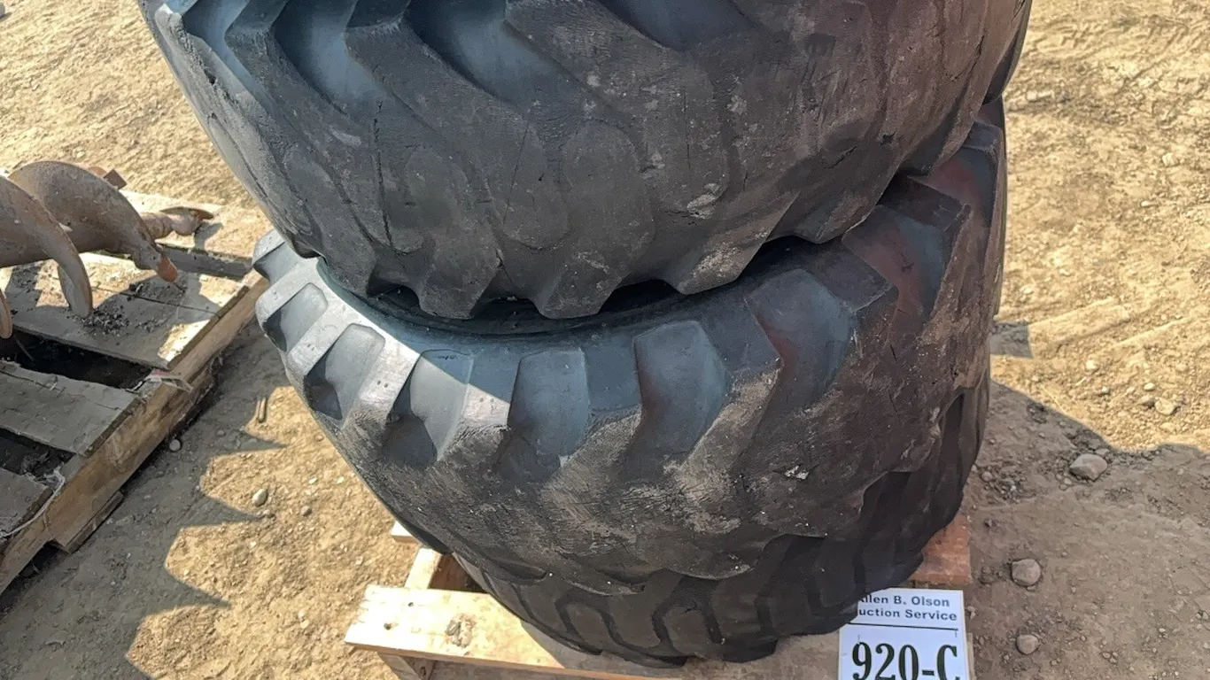4 - BOBCAT 10 - 16.5 TIRES ON RIMS