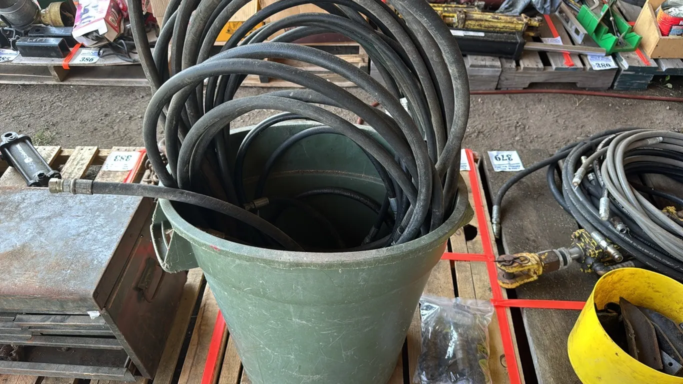 GARBAGE CAN FULL OF HYD HOSE & HYD COUPLER ENDS - MOSTLY PIONEER