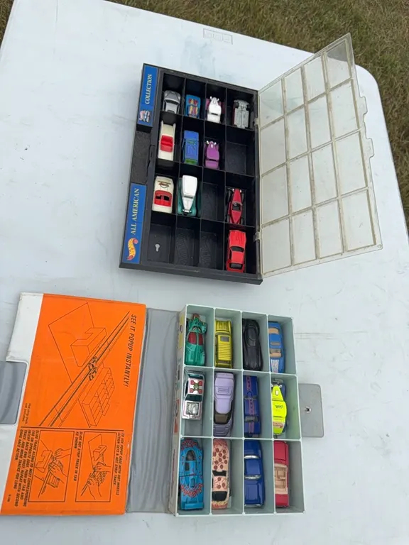 Hot wheel cars in 2 hot wheel carrying cases