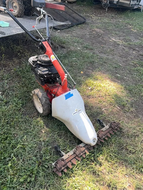 Self propelled push mower, has front sickle for cutting brush, used little, works great