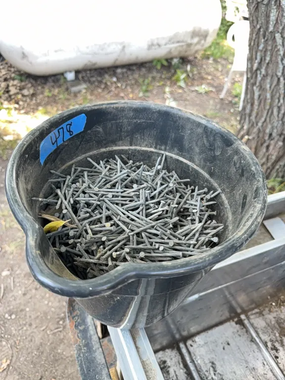 Pail of brand new nails
