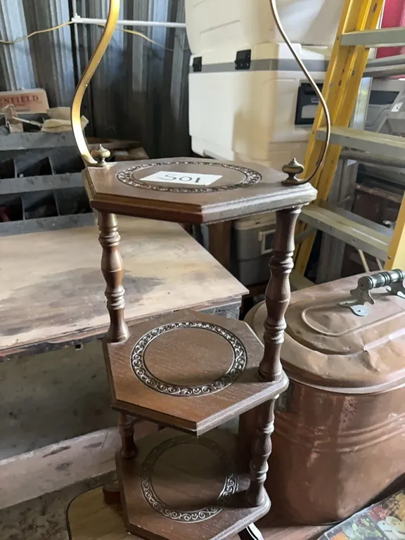 Unique brass and wood. Three tier shelf, 34 inches tall.