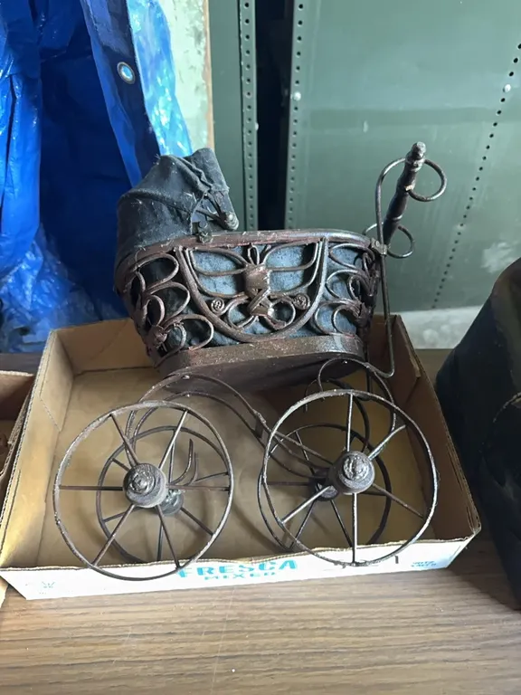 Vintage wicker and cloth doll buggy