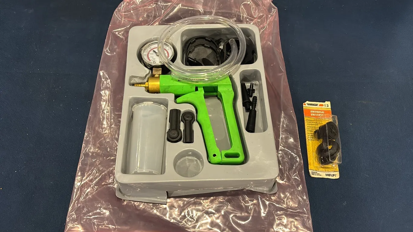 Vacuum pump/bleeder kit