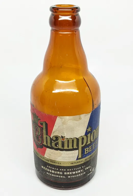 IRTP 12OZ PAPER LABEL STEINIE BOTTLE CHAMPION BEER REEDSBURG WISCONSIN