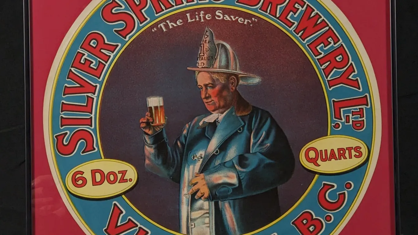 PRE PRO LITHO SIGN SILVER SPRING BREWERY VICTORIA BC BRITISH COLUMBIA CANADA FIREMAN "THE LIFE SAVER