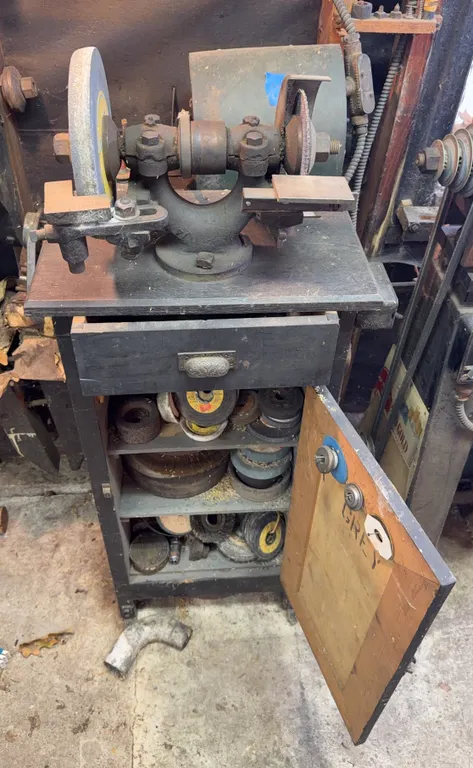 Sander and grinder combo with extra wheels