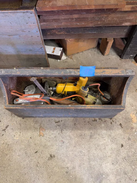 Tool chest with power drills and tools