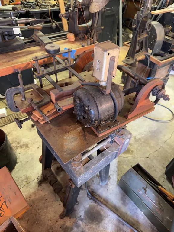 Vintage router table will need unbolted from the ground and un wired does run