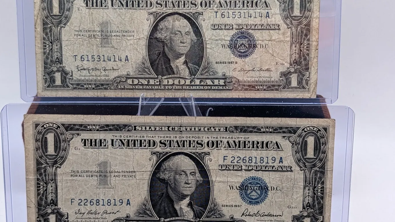 $1 Silver Certificate Lot – Series 1957 & 1957B Blue Seals – Circulated Duo – In Protective Sleeves