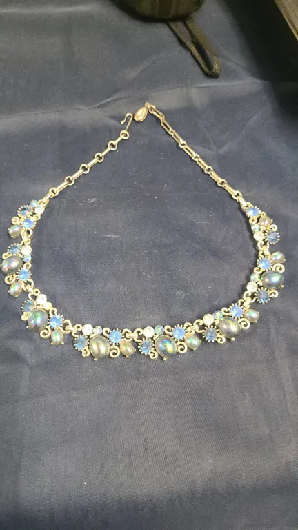 Two-Piece Jewelry Lot: Blue Rhinestone Necklace with Missing Crystal and Gold-Tone Link Chain BHLT-0