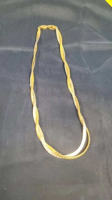 Avon Gold Tone and Silver Tone Twisted Herringbone Necklace with Textured Fold-Over Clasp Accents (S