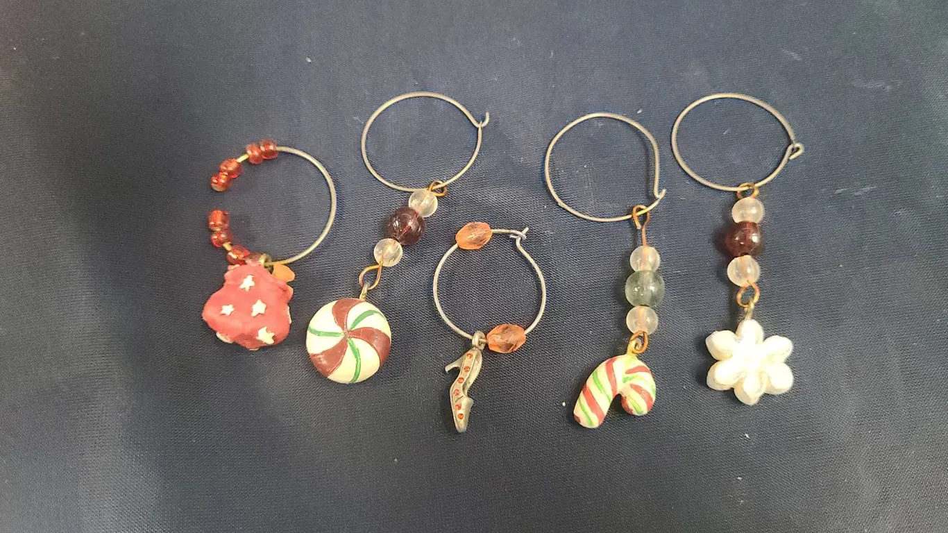 5 Holiday-Themed Beaded and Polymer Clay Wine Glass Charms With Festive Designs and Glass Beads