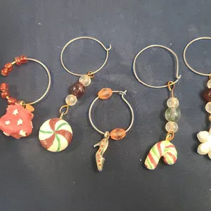5 Holiday-Themed Beaded and Polymer Clay Wine Glass Charms With Festive Designs and Glass Beads