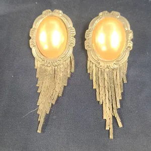 Ornate Gold-Tone Clip-On Earrings with Large Oval Pearlescent Centers and Fringe Design Accents
