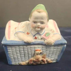 Hand-Painted Porcelain Trinket Box Depicting Child in Blanket with Basket and Toy Lamb Detail Lid Re